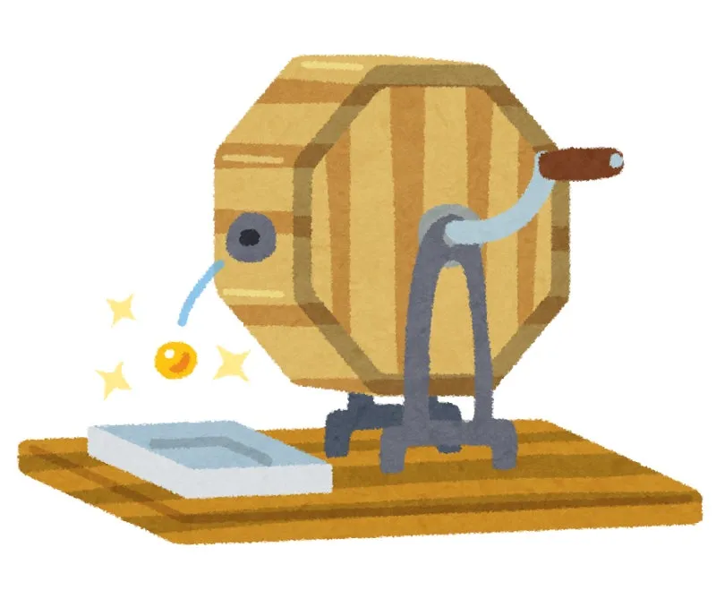 抽選機から玉が出ているイラストです。